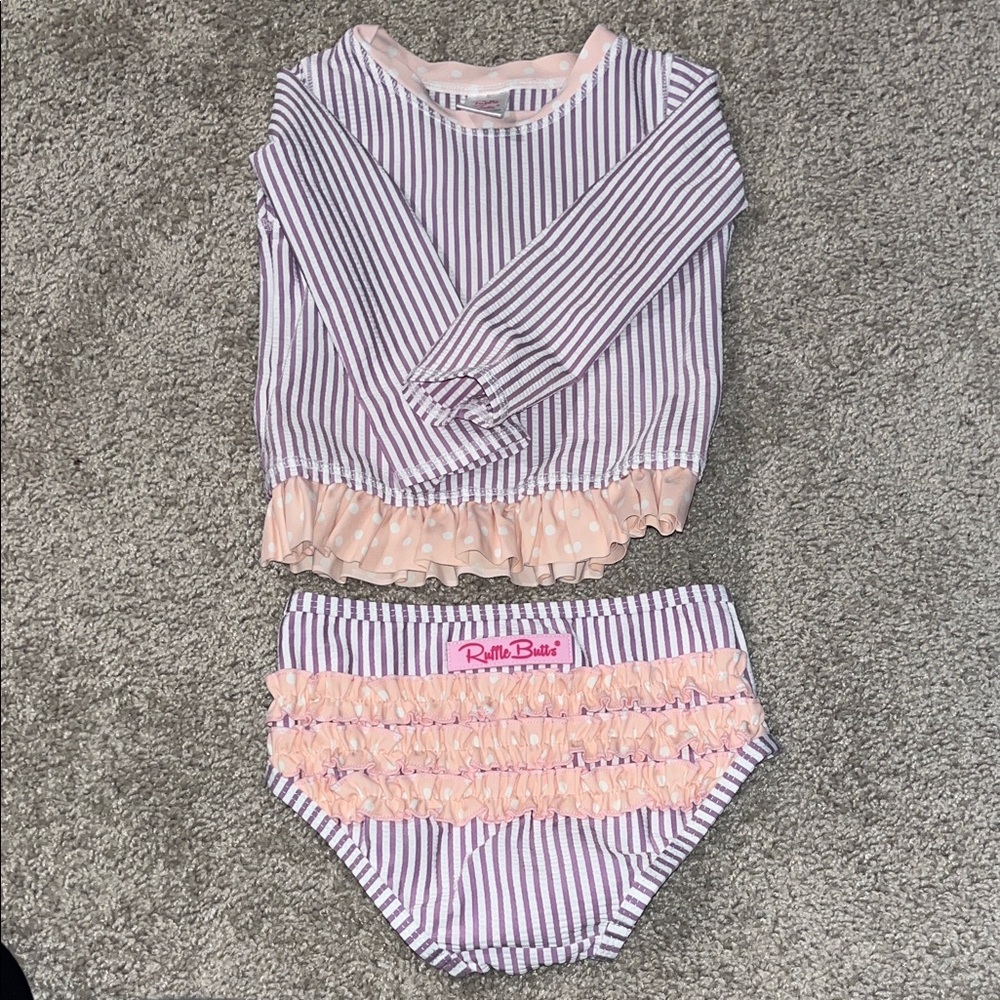 Ruffle Butts 2T Swimsuits. Green with pink floral and purple/white stripes